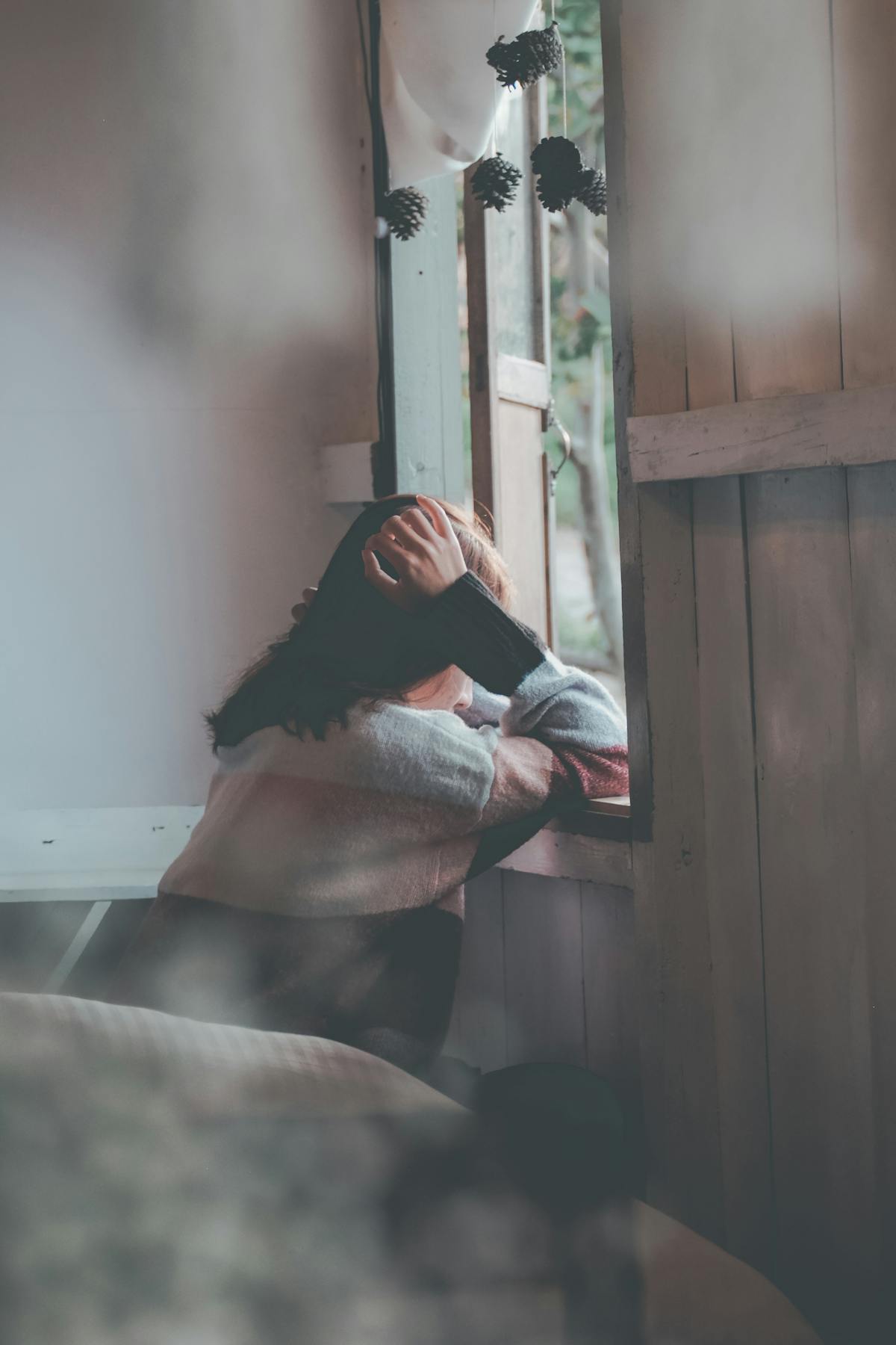 Pensive person in soft natural light